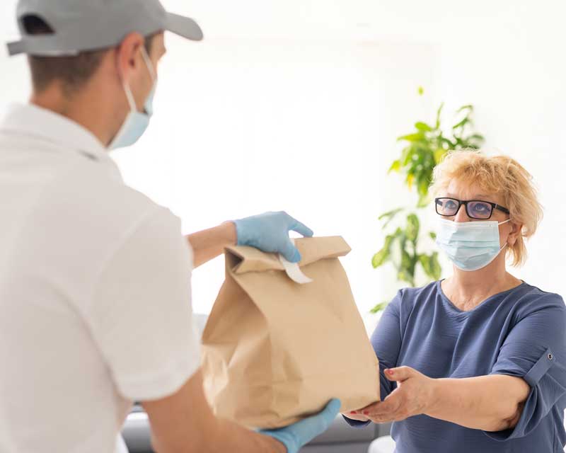 A person receiving a meal 