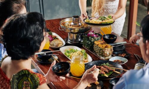 a family around a food-covered table